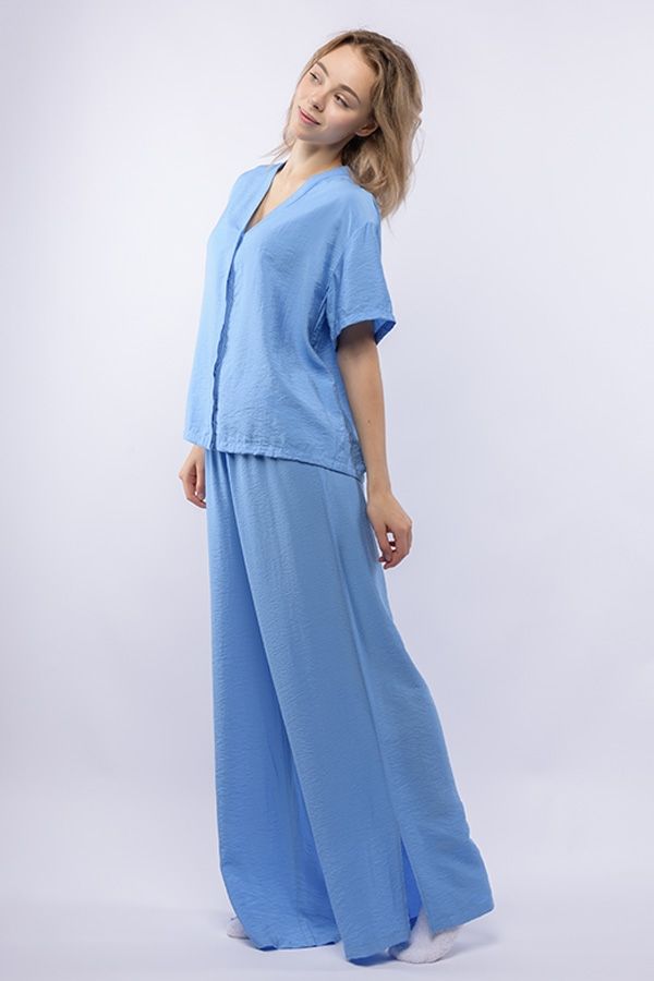 Ст.цена 1700р. Комплект жен. (блузка и брюки) Benuela голубой 0120243099