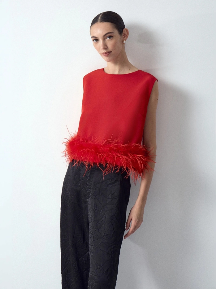 Топ с перьями ,
100% полиэстер ,