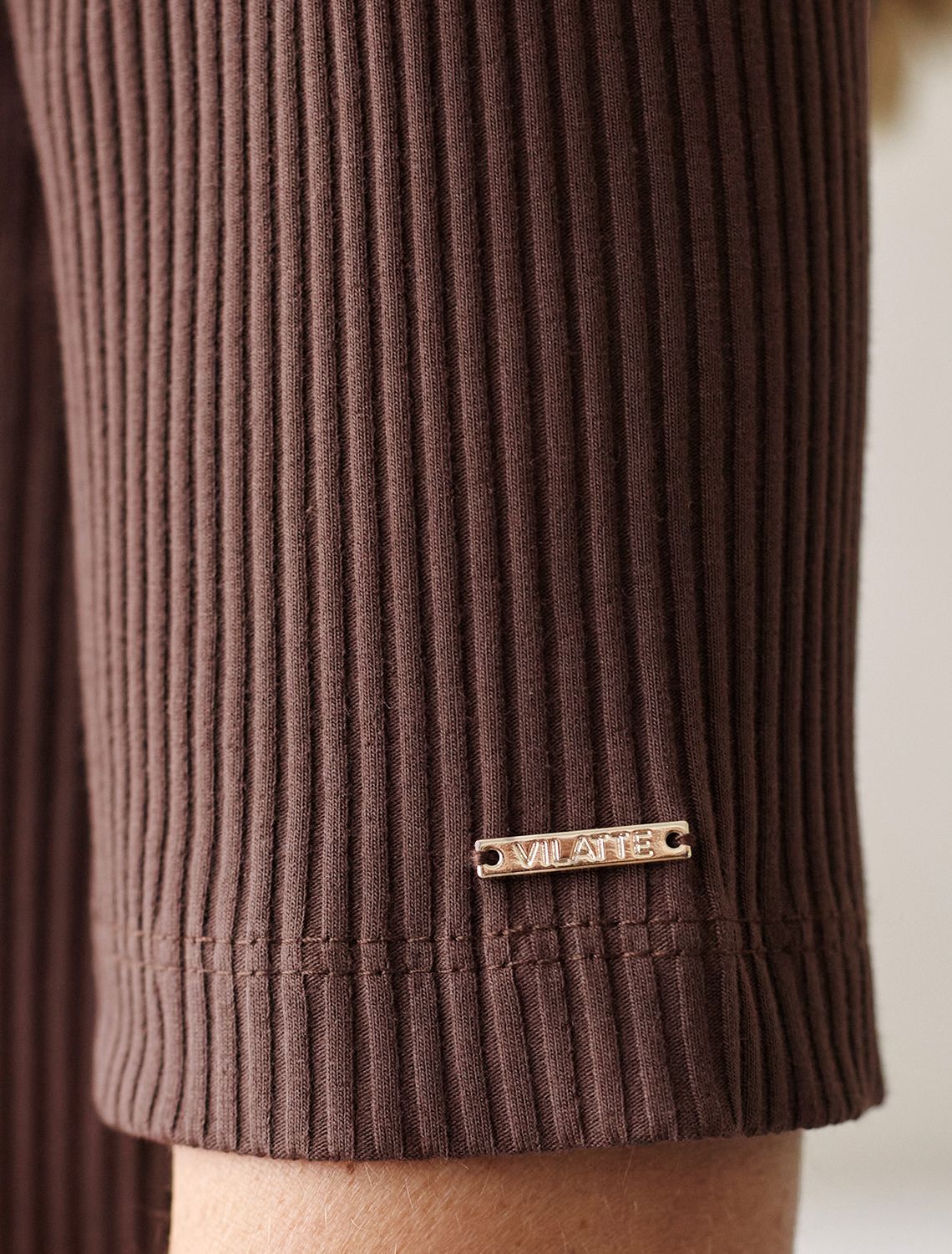 Водолазка из фактурного трикотажа в рубчик