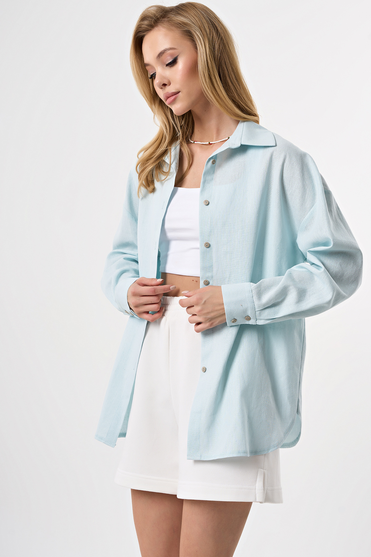 ст. цена2747руб.! Рубашка льняная с фигурной линией низа бледно-голубая