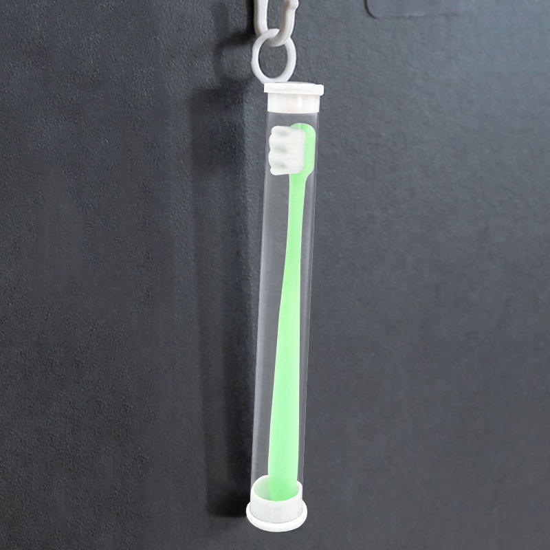 Зубная щетка с волнистой головкой зеленая в трубке, 1 шт