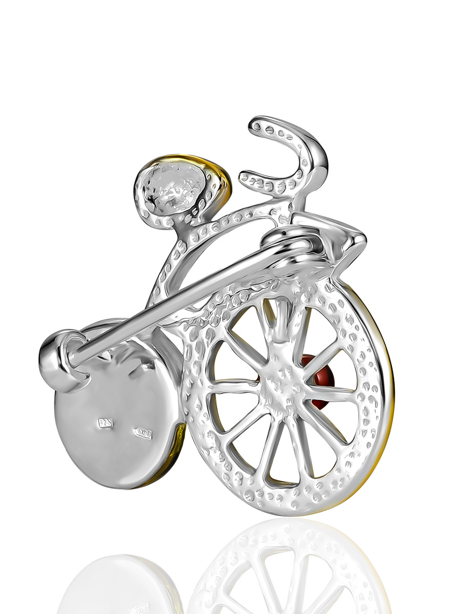 Брошь с золочением, украшенная зелёным янтарём «Велосипед»