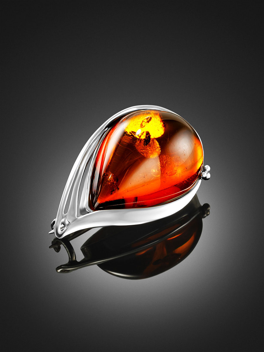 Брошь «Риальто» из янтаря коньячного цвета с искрами