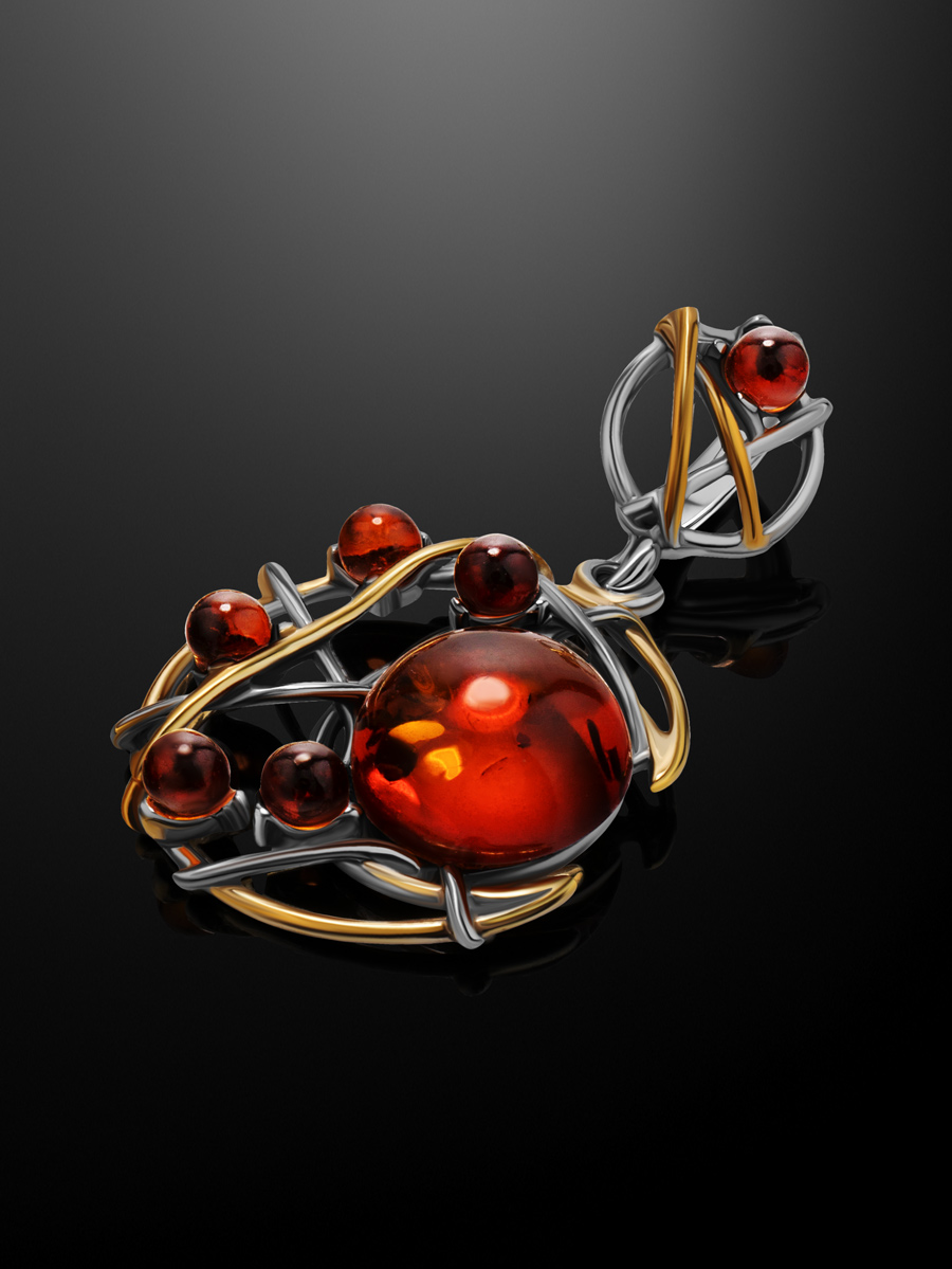Ажурная подвеска, украшенная янтарём коньячного цвета «Согдиана»