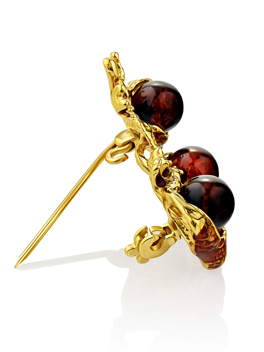 Оригинальная брошь «Гранат» из тёмно-вишнёвого янтаря