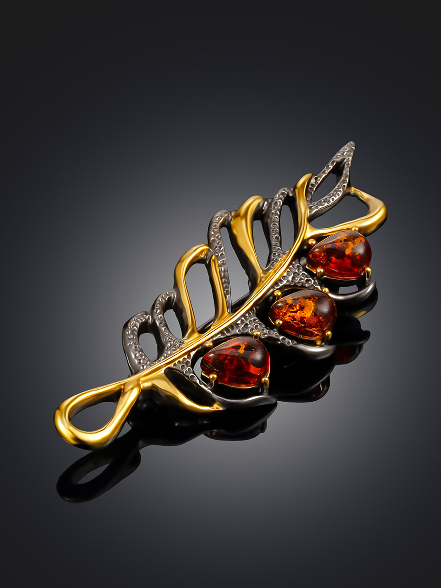 Изящная ажурная брошь с чернением и золочением «Перышко»