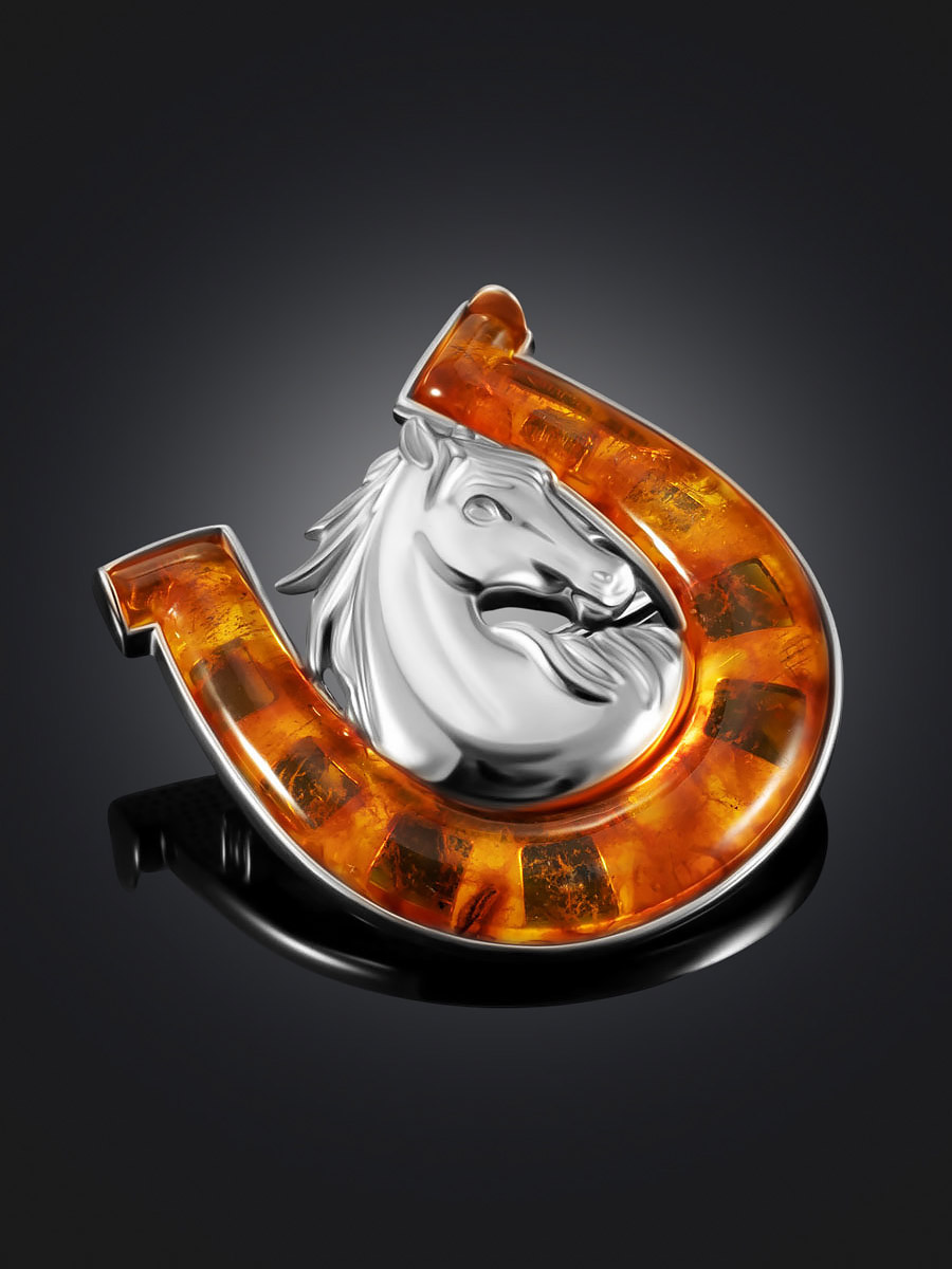 Брошь с символом 2026 года «Подкова», украшенная янтарём