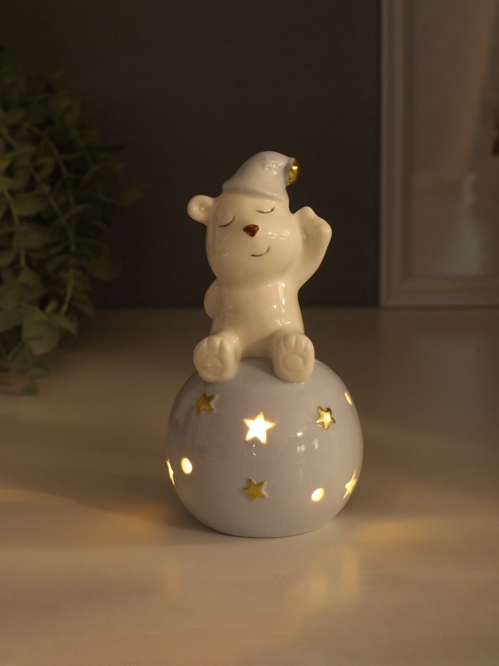 Фигурка светящаяся «Медвежонок в голубом колпаке на шаре со звёздами», керамика, 8×8×15 см